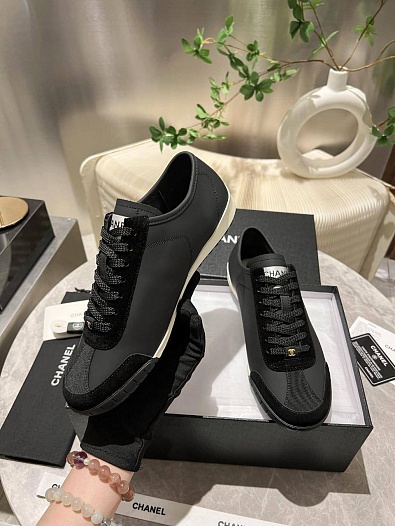 Женские кожаные кроссовки Chanel чёрного цвета   