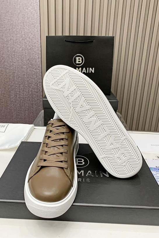 Кожаные кроссовки Balmain бежевого цвета