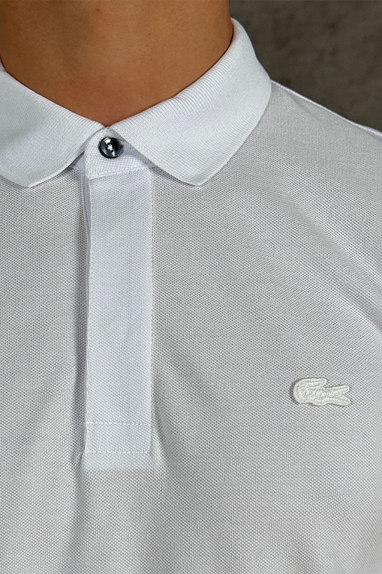 Мужское поло Lacoste белого цвета