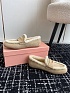 Женские бежевые лоферы с мехом MIU MIU