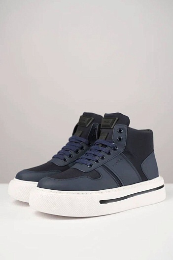 Комбинированные кроссовки с мехом Prada   