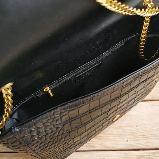 Женская чёрная кожаная сумка Yves Saint Laurent 32x19 см