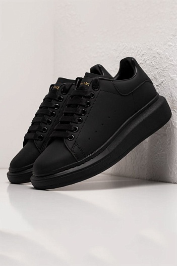 Кожаные кроссовки Alexander McQueen чёрного цвета   