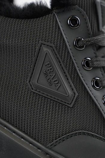 Комбинированные кроссовки с мехом Prada   