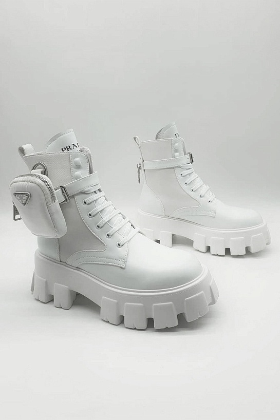 Кожаные женские ботинки Prada белого цвета