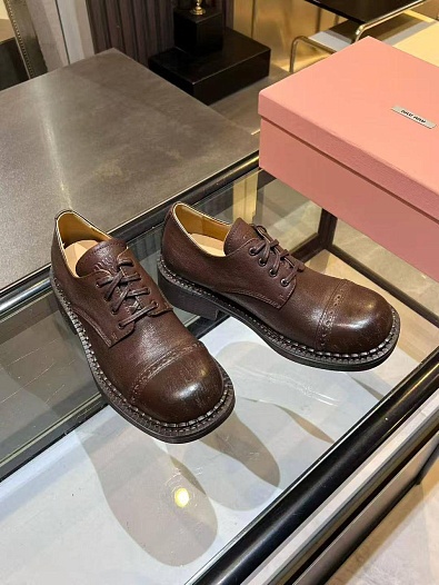Женские кожаные ботинки дерби MIU MIU   