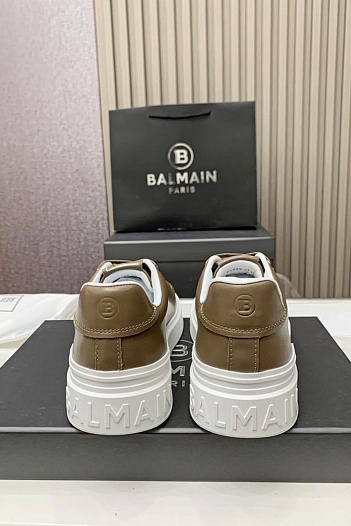 Кожаные кроссовки Balmain бежевого цвета   