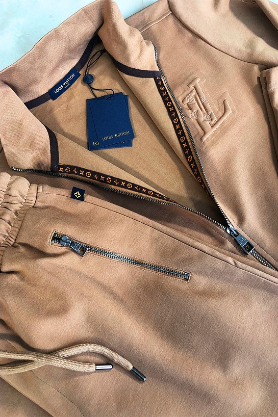 Брендовые штаны Louis Vuitton бежевого цвета