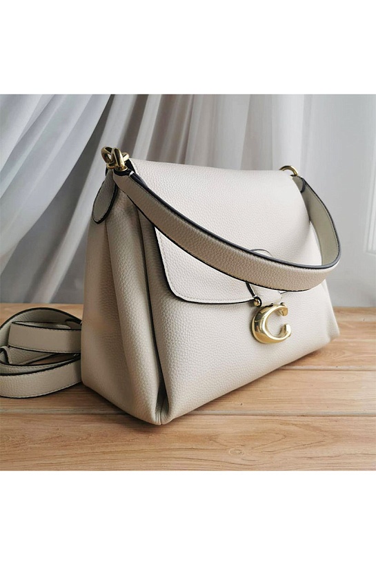 Кожаная сумка белого цвета Coach May 31x23 см