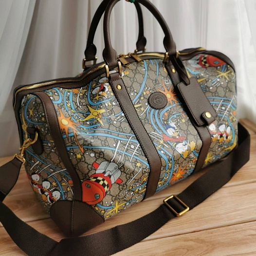 Дорожная кожаная сумка Gucci Disney GG Supreme 45x28 см   