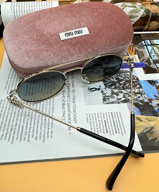 Женские солнцезащитные очки MIU MIU Oval