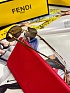 Коричневые солнцезащитные очки Fendi